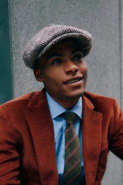 Muirfield Herringbone Bakerboy Cap -Lock & Co. Hatters MUIRFIELD HERRINGBONE BAKERBOY CAP LIFESTYLE SHOT 2